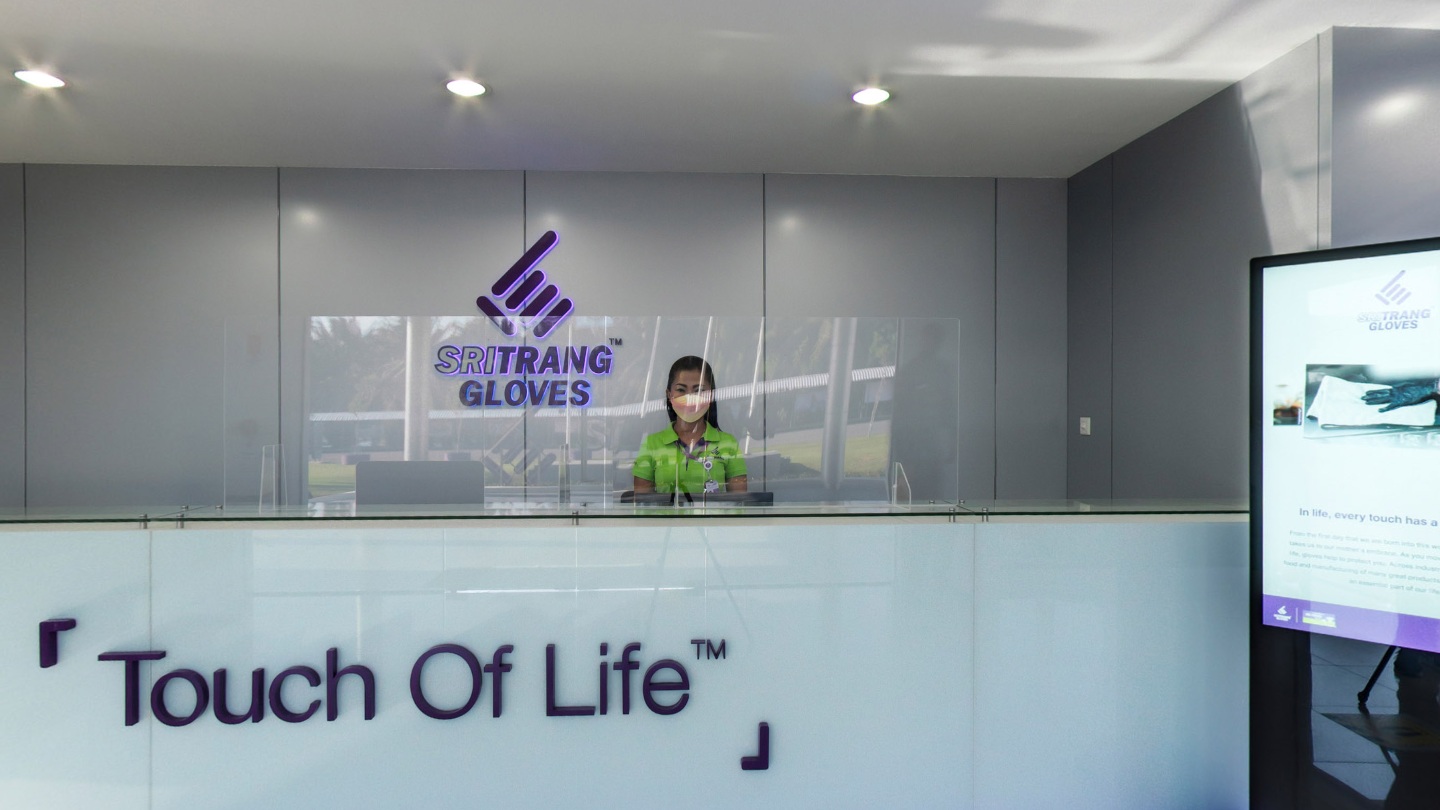 Sri Trang Gloves reception desk and branded entrance area